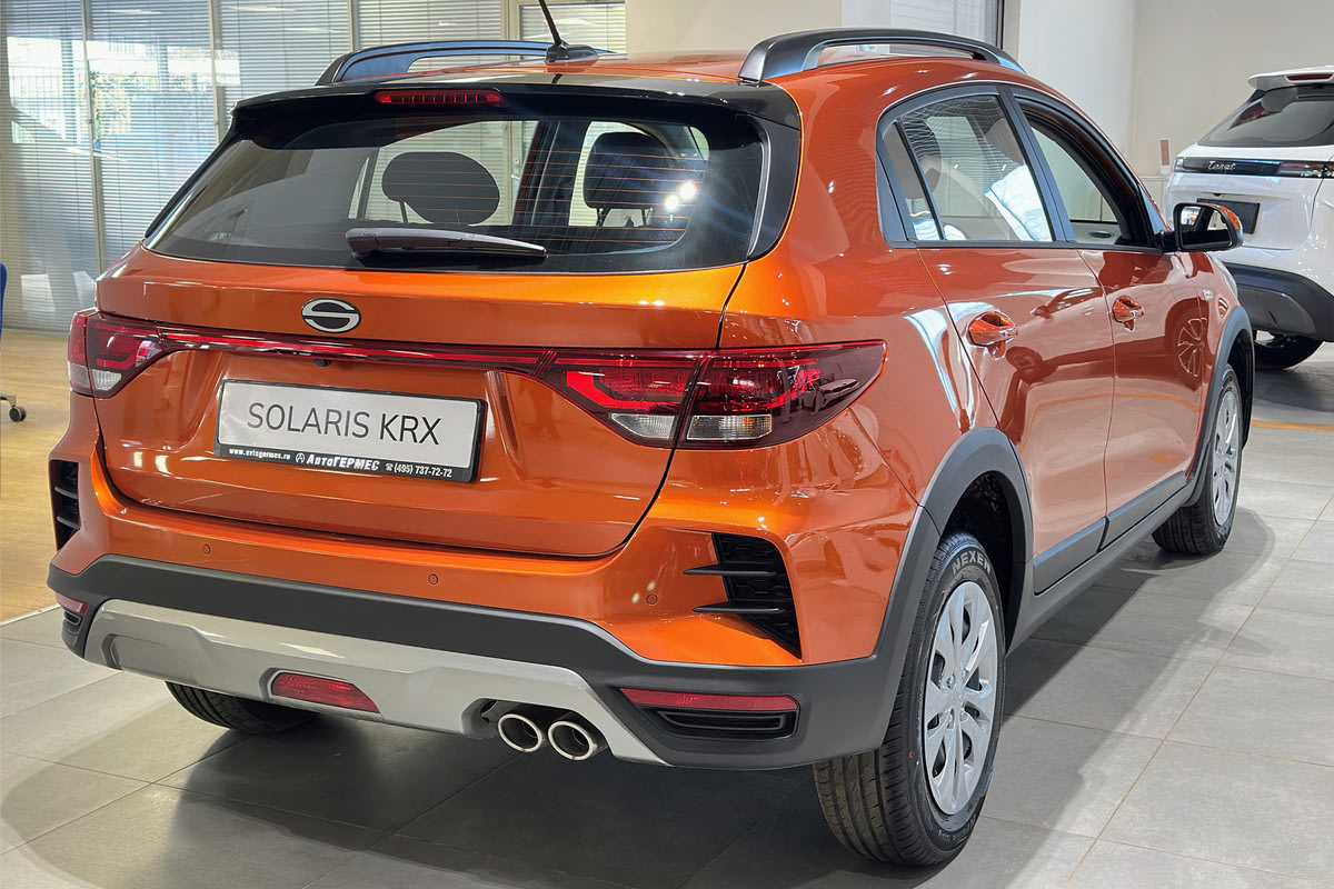 Фото Kia Rio X (Solaris KRX) I Люкс АВ (Luxe AV) Оранжевый металлик I 2025, №4