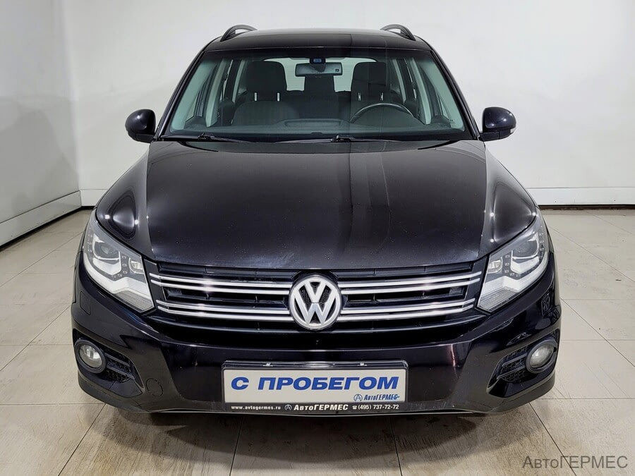 Фото Volkswagen Tiguan I Рестайлинг с пробегом | №2