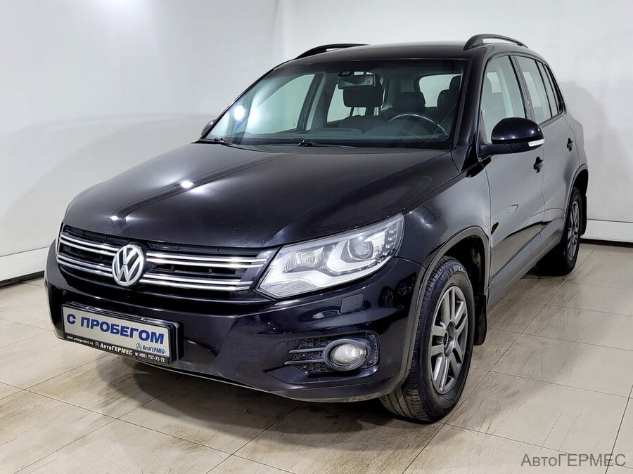 Фото Volkswagen Tiguan I Рестайлинг с пробегом | №1