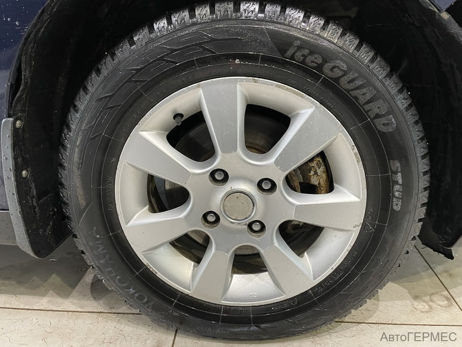 Фото NISSAN Tiida I с пробегом | №13