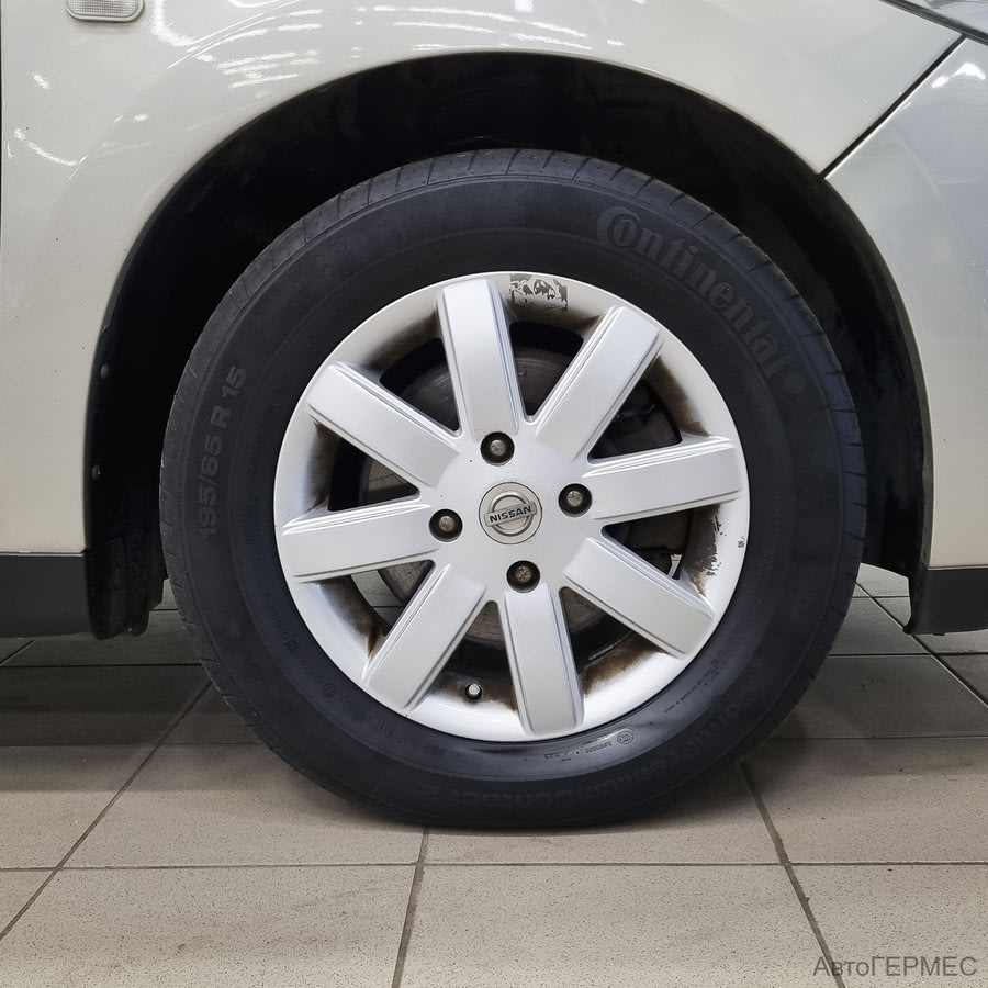 Фото NISSAN Tiida I с пробегом | №14