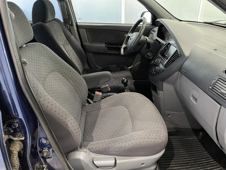 Фото Kia Carens I (RS) Рестайлинг с пробегом | №11