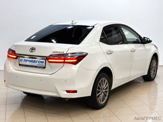 Фото TOYOTA Corolla XI (E160, E170) Рестайлинг с пробегом