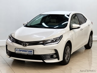 Фото TOYOTA Corolla XI (E160, E170) Рестайлинг с пробегом