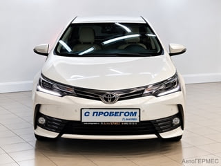 Фото TOYOTA Corolla XI (E160, E170) Рестайлинг с пробегом