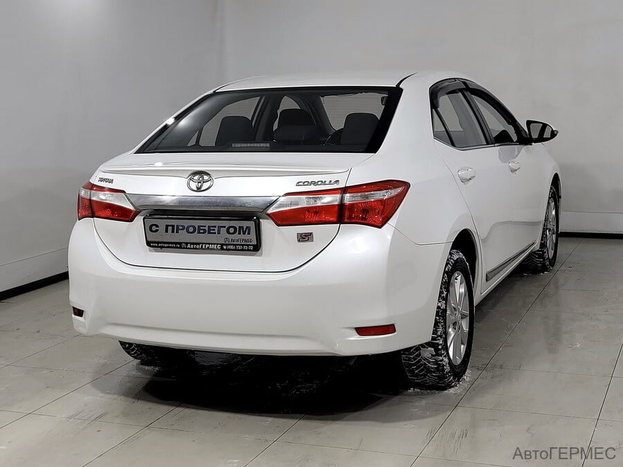 Фото TOYOTA Corolla XI (E160, E170) с пробегом | №4