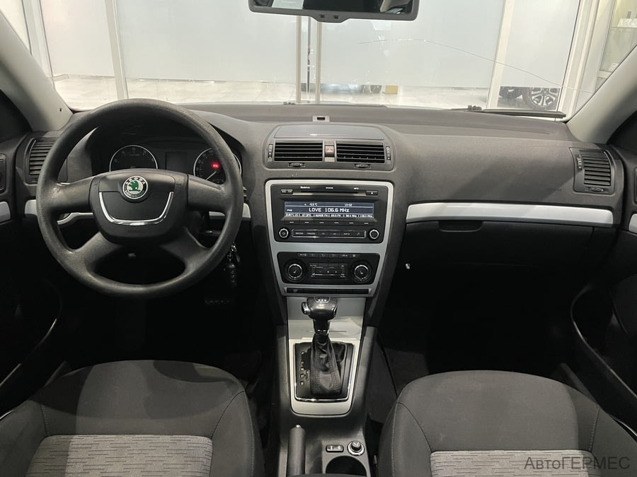 Фото SKODA Octavia II Рестайлинг с пробегом | №5