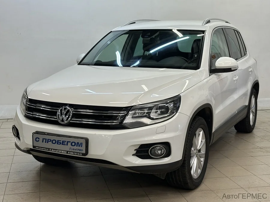 Фото Volkswagen Tiguan I Рестайлинг с пробегом | №1