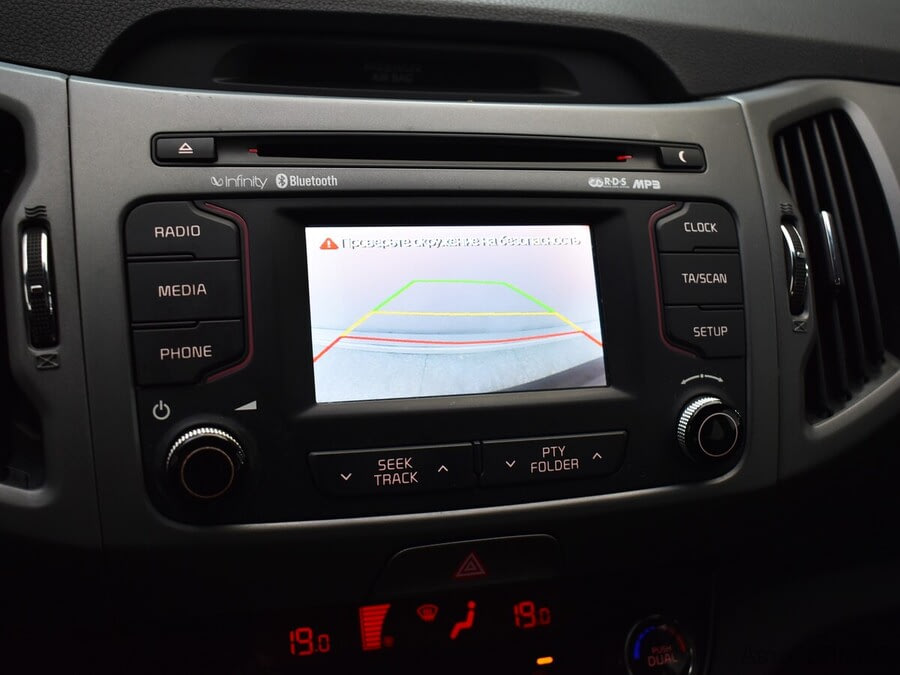 Фото Kia Sportage III Рестайлинг с пробегом | №8